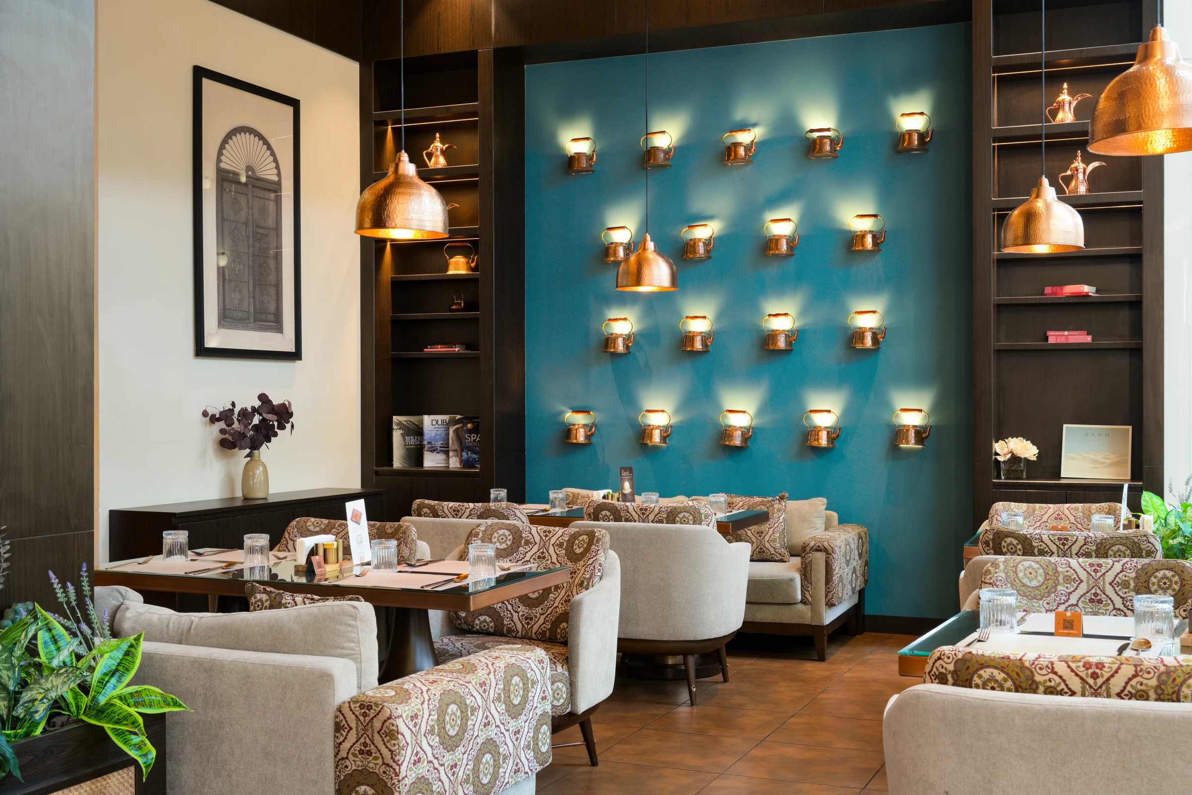 Karaki Lounge seating with teal display wall
